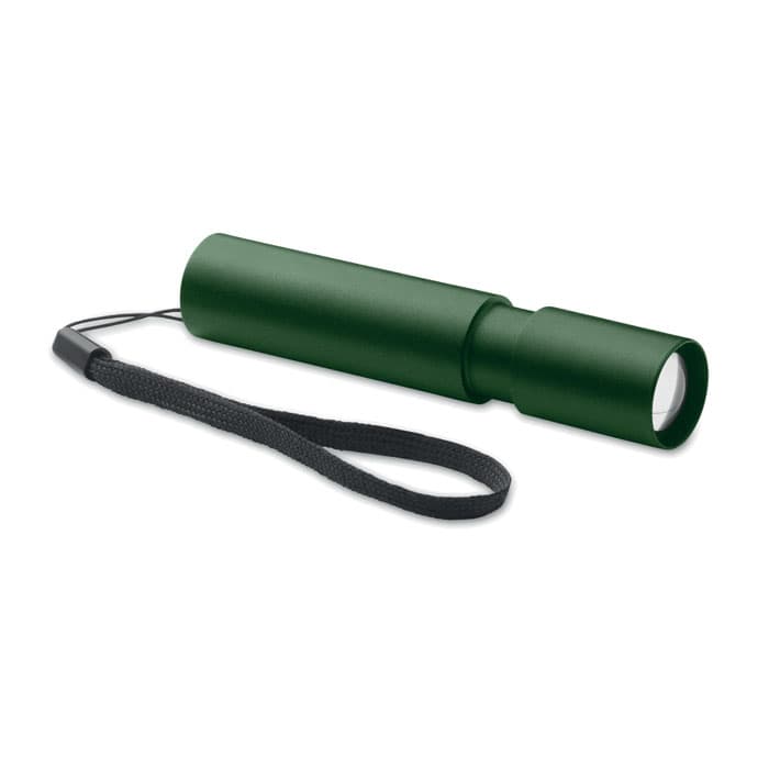 A green flashlight with a wrist strap, featuring a cylindrical design and a clear lens at one end.