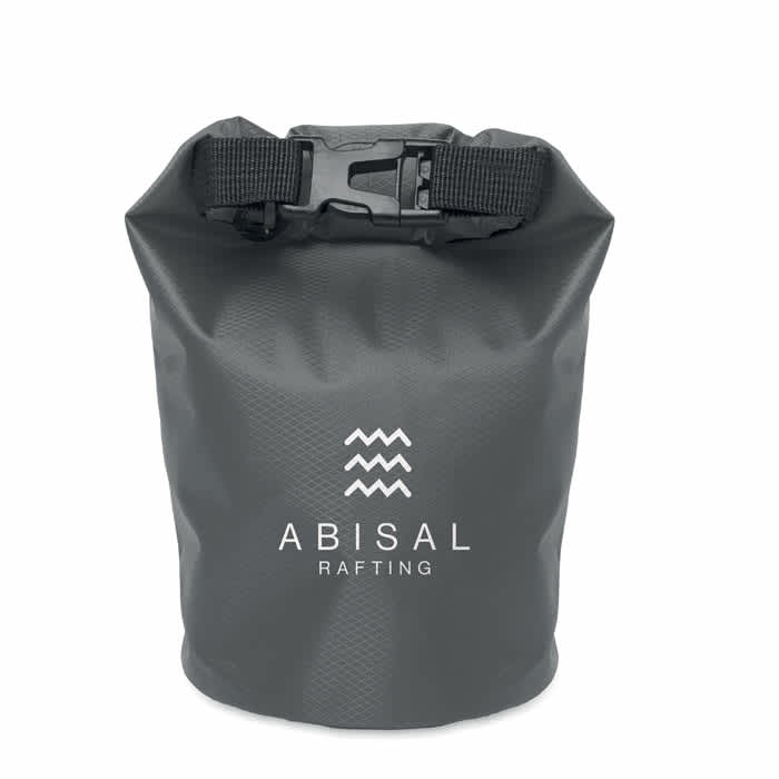 A waterproof black bag with a clip closure and a logo prominently displayed on the front.