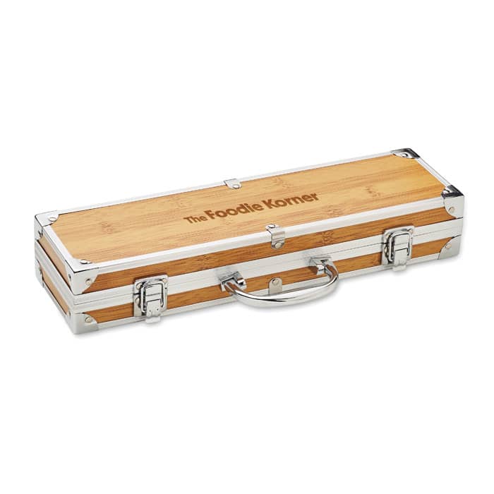 A bamboo wooden case with silver accents and a handle. It features a logo on the surface.