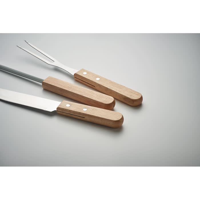 A set of three cooking tools with stainless steel blades and wooden handles. The items include a knife and a fork.
