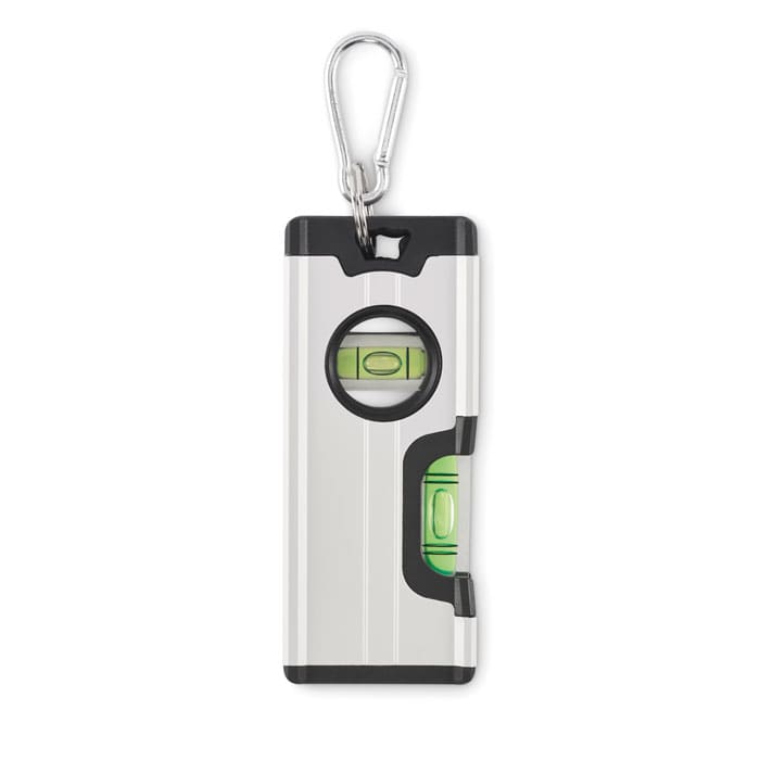 A spirit level with a metallic silver body, featuring two green vials and a keychain clip.