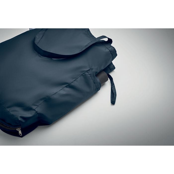 A foldable navy drink bottle carrier with a strap and zipper, featuring a logo.