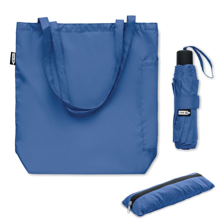 A blue tote bag with two accessories: a matching umbrella and a zippered pencil case, all featuring a logo.