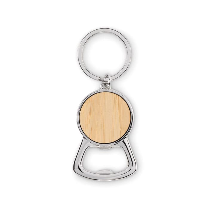 A keyring bottle opener featuring a silver metal frame with a circular wooden centre.