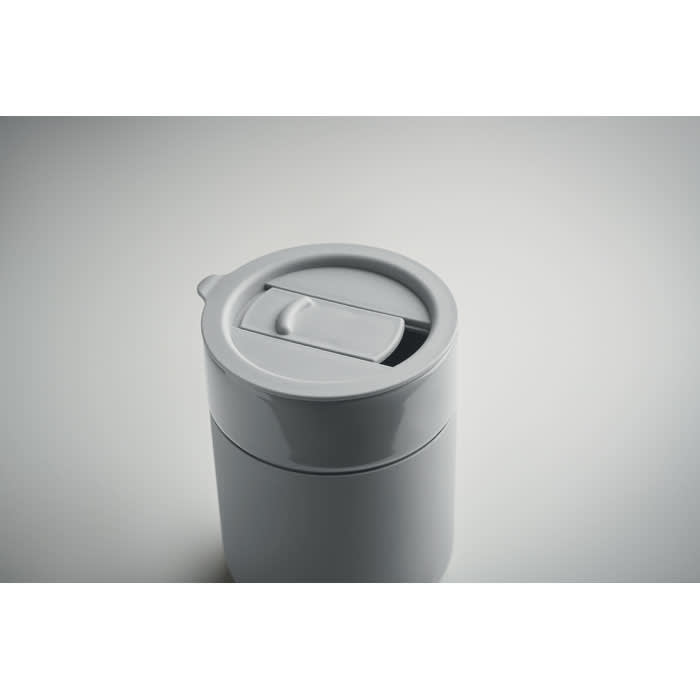 A drink bottle in white with a grey lid, featuring a flip-top spout and a simple branding logo.