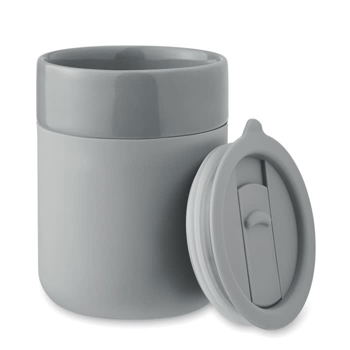 A grey drink bottle with a lid beside it, featuring a smooth, rounded design and a matte finish.