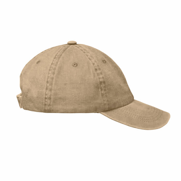 A beige cap with a curved brim and ventilation holes, featuring a logo on the back.