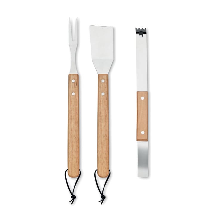 A set of three grilling tools, featuring a fork, spatula, and tongs with wooden handles and metal heads.
