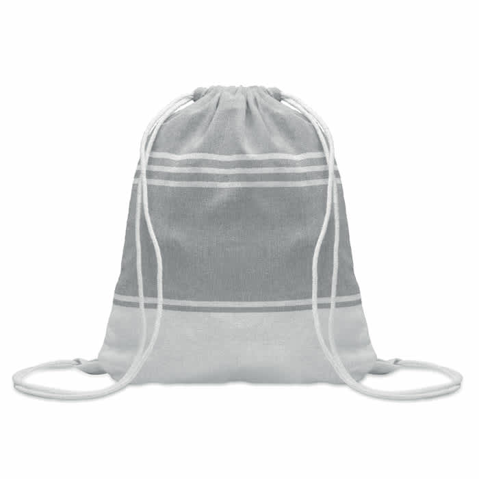 A drawstring bag in grey with white striped patterns and matching drawstrings. It features a logo.