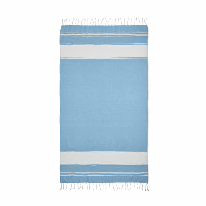 A blue towel features white stripes and fringed edges, suitable for beach or pool use. It has a simple, classic design.