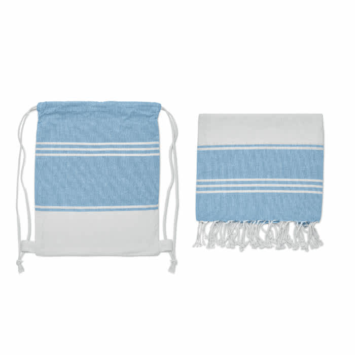 A drawstring bag and a towel in light blue and white with striped patterns, featuring fringing on the towel.