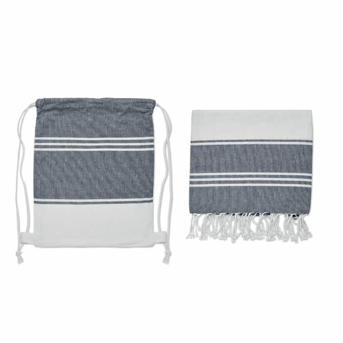 A drawstring bag and a matching towel in navy blue and white, featuring stripes and fringe detailing.
