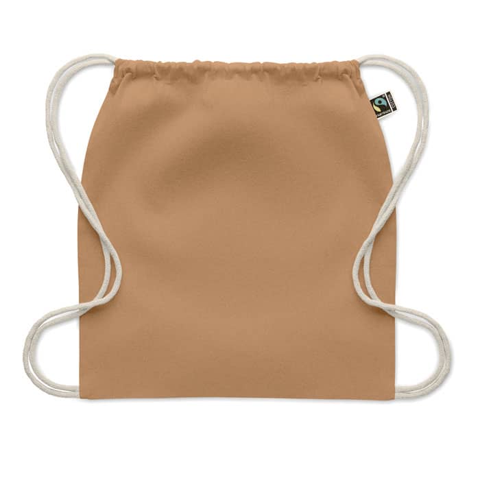 A drawstring bag in a warm beige colour with white cords and a small logo tag.