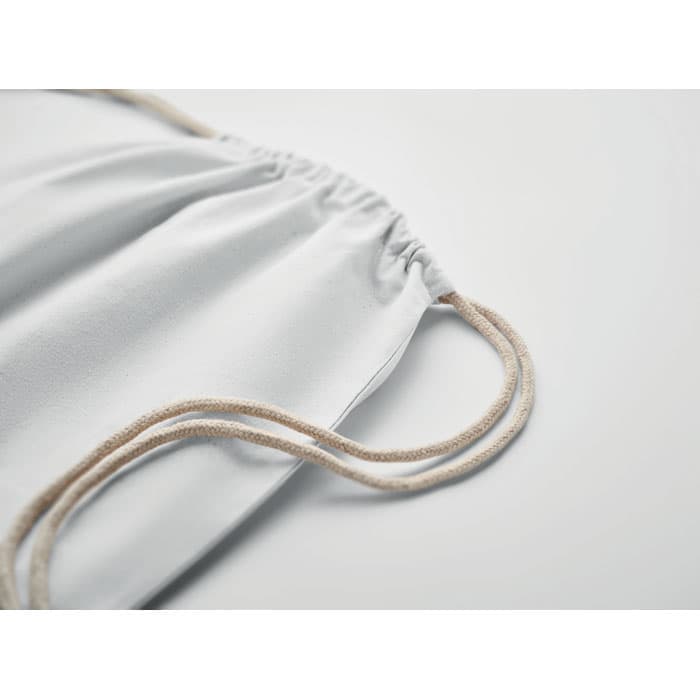 A light grey face mask with elastic straps, featuring a gathered design for a snug fit.