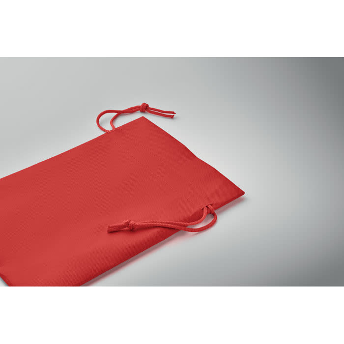 A red drawstring pouch with two ties at the top, featuring a smooth, solid colour design.