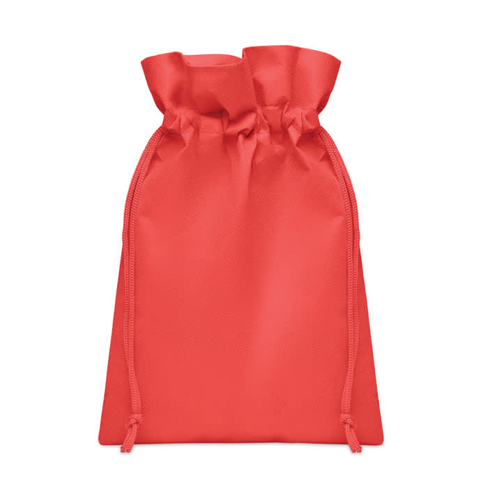 A red drawstring pouch made from smooth material with gathered top and adjustable ties.