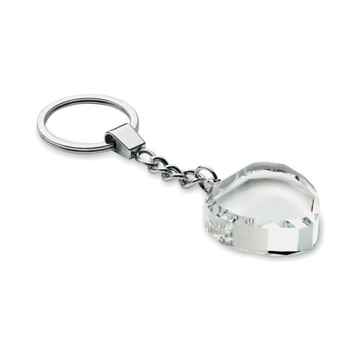 A keychain featuring a clear, faceted crystal pendant attached to a metal ring.