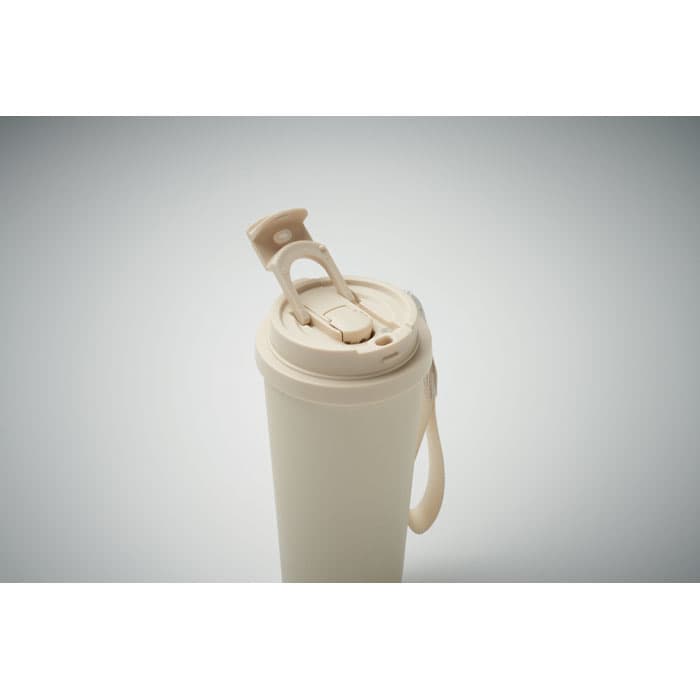 A drink bottle in a creamy off-white colour with a flip-top lid and a carry handle. It features a branding logo.