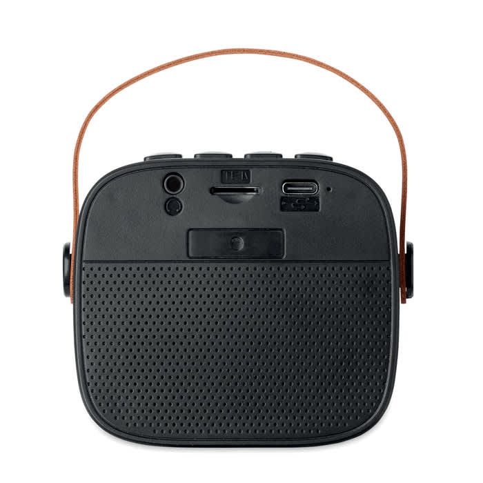 A portable speaker in black with an orange strap, featuring various input and charging ports.
