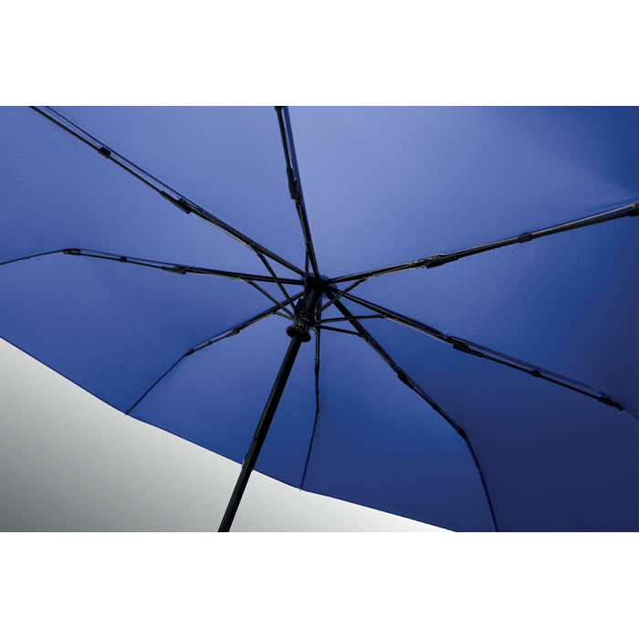 An umbrella featuring a deep blue canopy and a black frame, showcasing its ribbed structure from underneath.