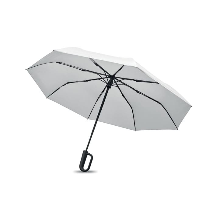 An umbrella with a white canopy and a black handle, featuring a black metal frame and spokes.