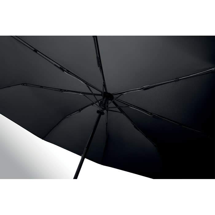 A black umbrella with a sturdy structure and a visible metal frame. The underside showcases the intricate mechanics.