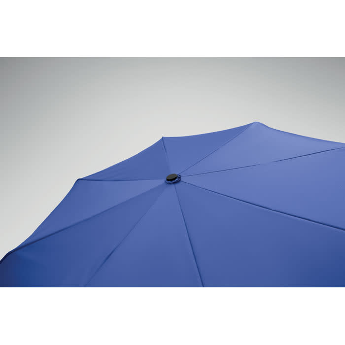 A blue umbrella with a circular top button and eight panels, featuring a simple design and sleek finish.