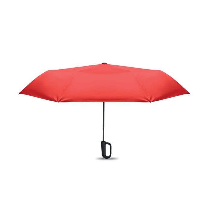 A red umbrella with a black handle and a straightforward design, featuring a sleek shape and sturdy frame.