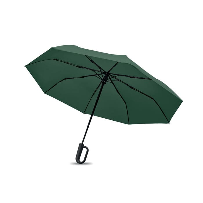 A green umbrella with a black handle and an automatic opening mechanism. It has a curved design and multiple ribs.