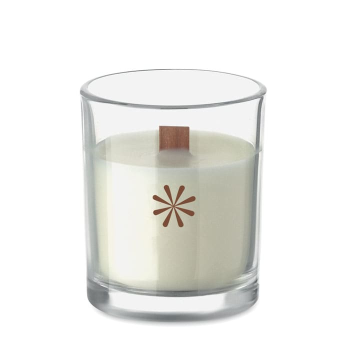 A glass candle featuring a wooden wick and a light-coloured wax, with a simple logo on the front.