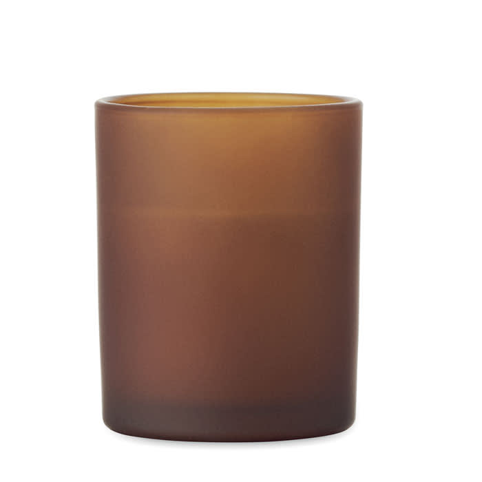 A drink bottle in a frosted amber glass, featuring a simple cylindrical shape and a smooth finish.
