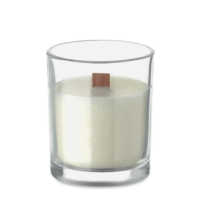 A glass candle with a wooden wick and creamy white wax, presented in a simple, clear holder.