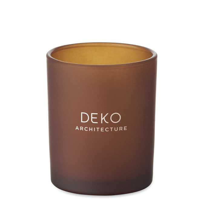 A candle holder in a matte brown finish with a gold interior, featuring a logo on the front.