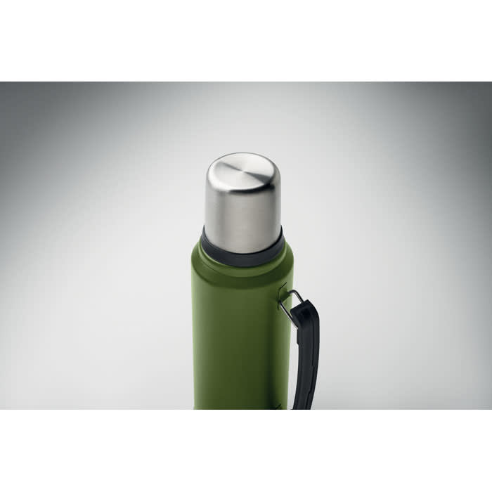 A drink bottle in olive green with a stainless steel lid and a black handle, featuring a logo.