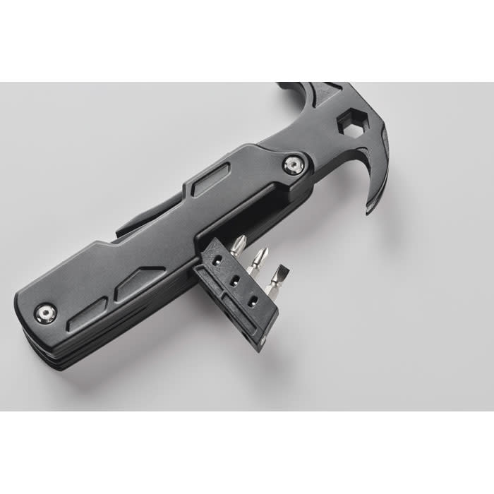A multifunctional tool featuring a black hammer head, screwdriver bits, and a sleek handle design.