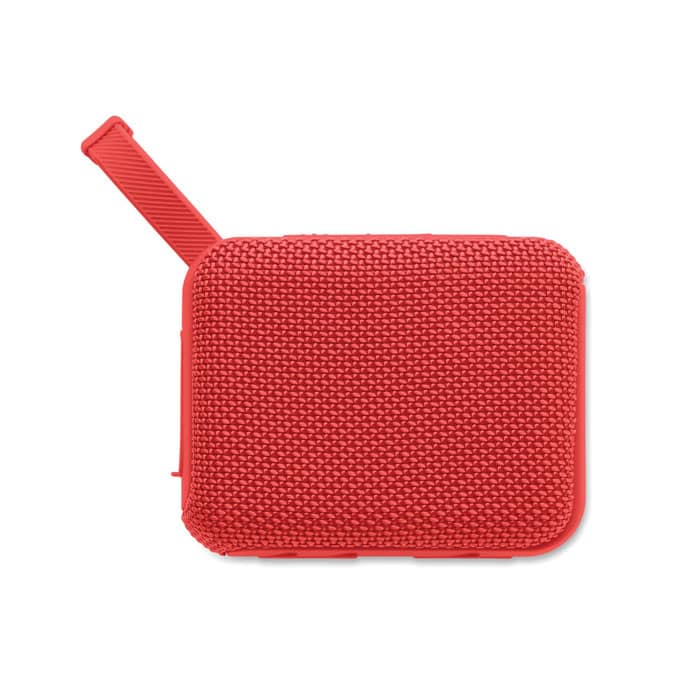 A red promotional product with a textured surface and a strap for easy carrying. It features a logo.