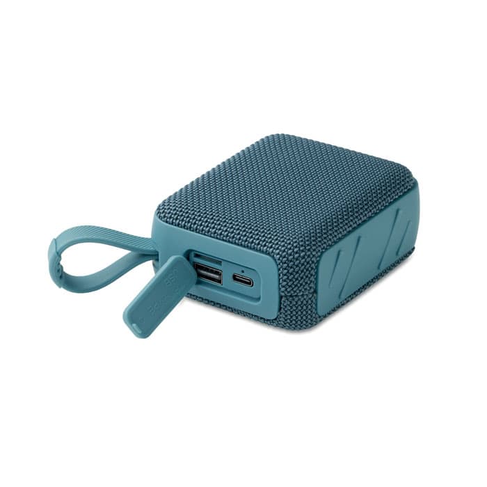 A teal power bank with a textured surface and a USB port. It includes a small loop for easy carrying.