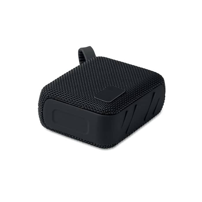 A compact black speaker with a textured mesh exterior and a sturdy base. It has a loop for easy carrying.
