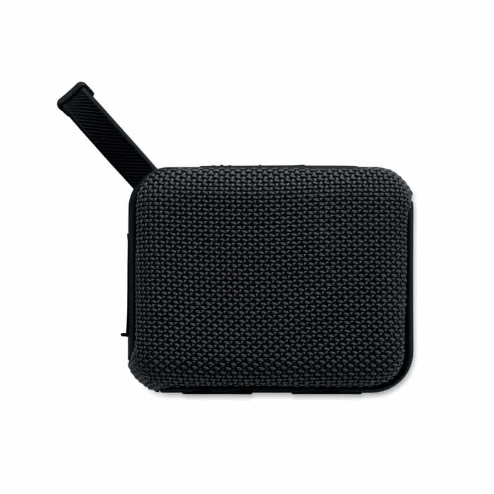 A portable speaker with a textured black exterior and a carry handle on one side.