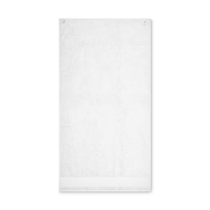 A white towel featuring a simple design and a loop for hanging.
