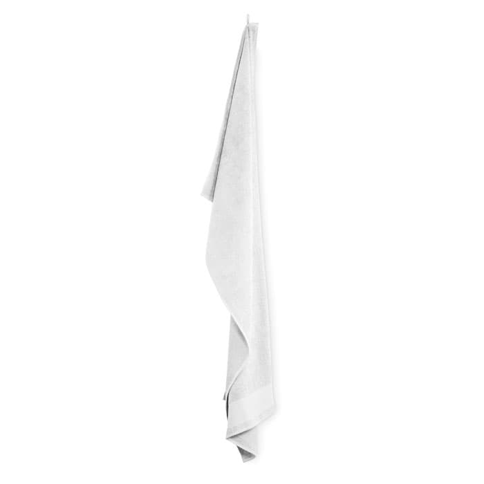 A white towel hanging, displaying a soft and smooth texture. It has a simple and elegant design.