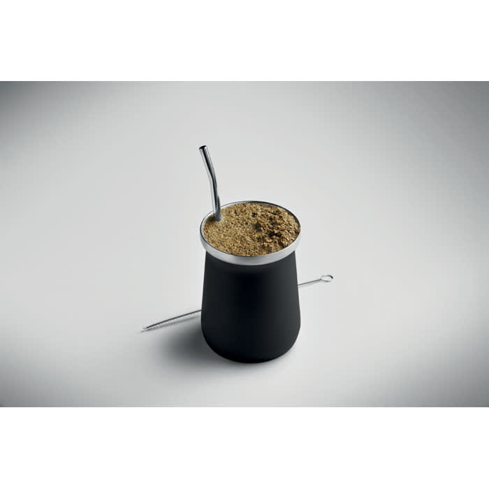 A drink bottle in black with a silver straw and a metal accessory, containing a light brown substance.