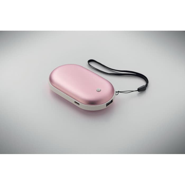 A pink, oval-shaped case with a strap, featuring a sleek design and a small logo.