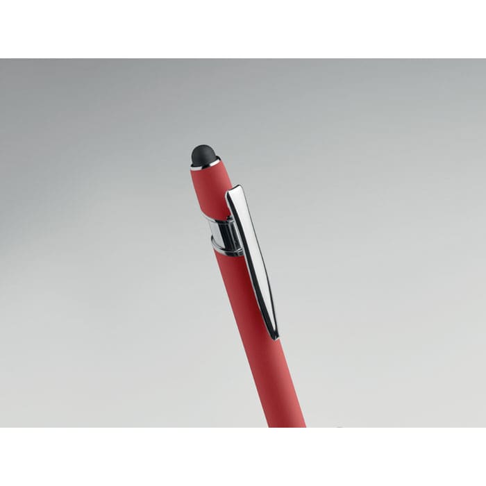 A red pen with a chrome clip and a black stylus tip. It features a sleek, modern design.