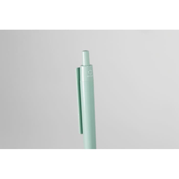 A mint green pen featuring a clip and a rounded top, alongside a simple logo.