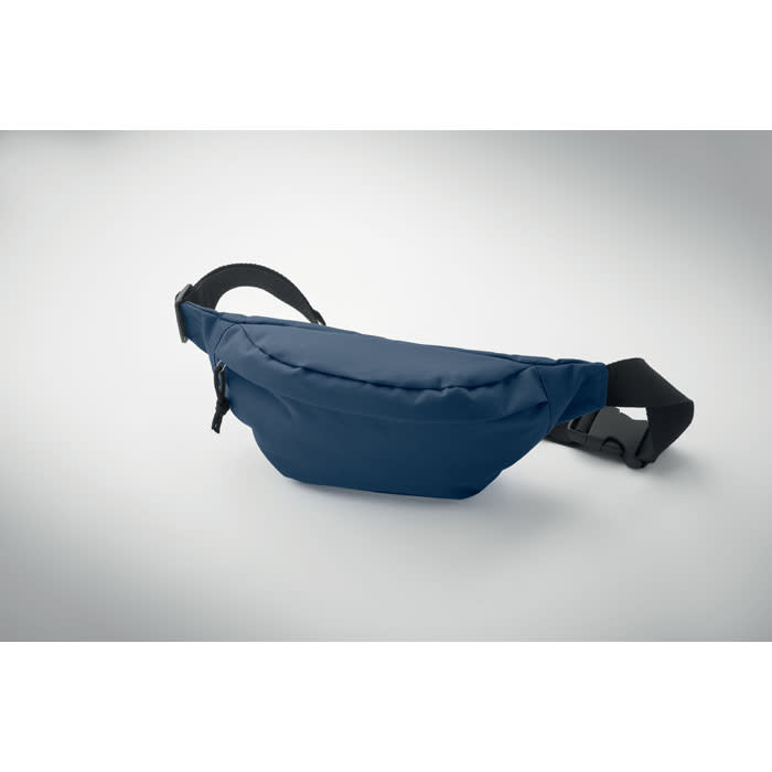 A fanny pack in navy blue with a zippered pocket and adjustable strap. The pack has a simple, sleek design.