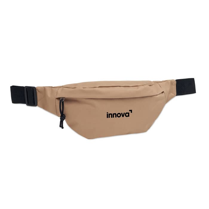 A tan bum bag with a zippered pocket and an adjustable strap, featuring a branding logo.
