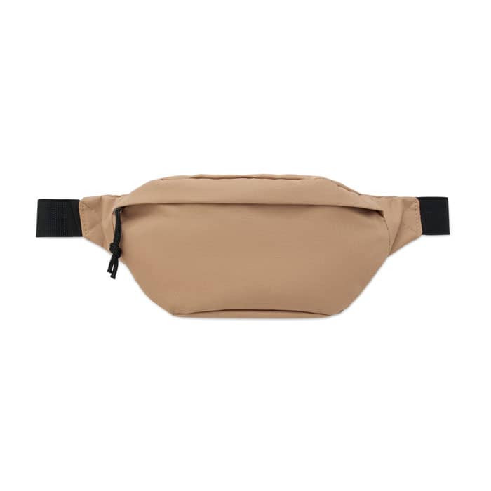 A fanny pack in a tan colour with a zippered front pocket and an adjustable black strap. Features a logo.