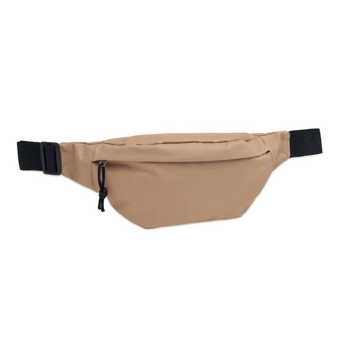 A fanny pack in beige with an adjustable strap and a front zippered pocket. It features a simple, minimalist design.