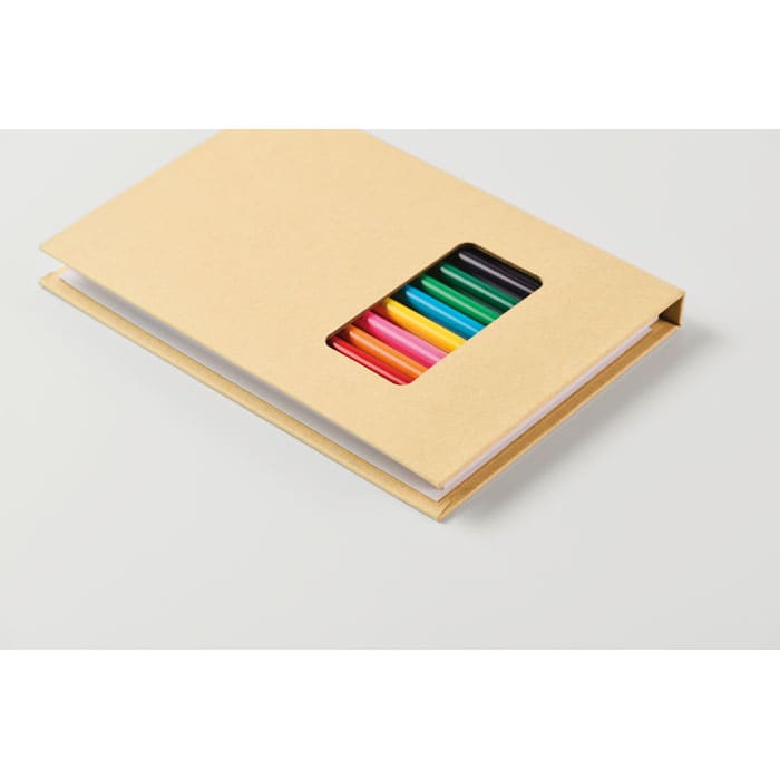 A beige notebook with a cut-out revealing colourful pens inside. The product has a simple and minimalist design.